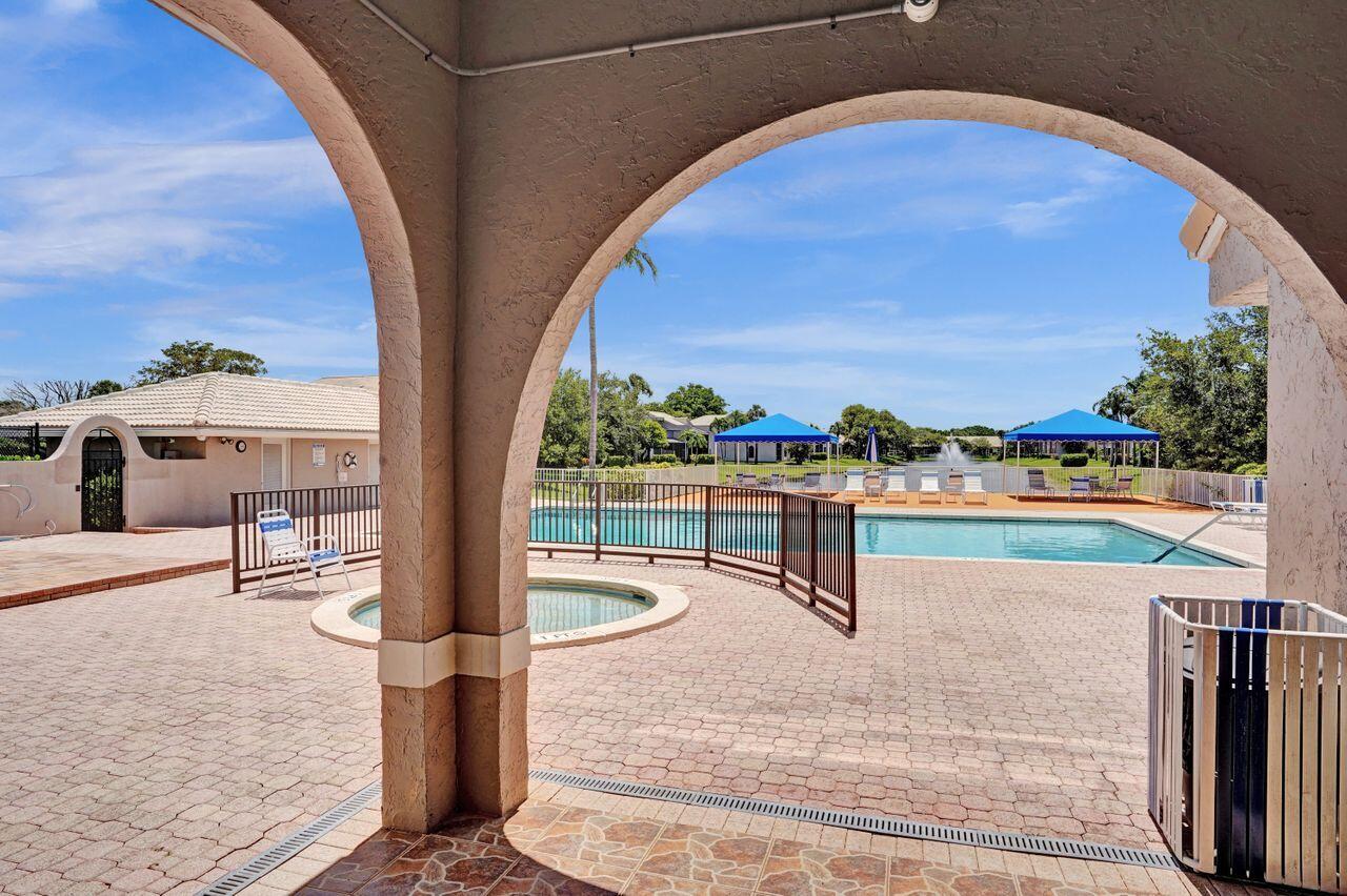 5465 Monterey Circle, Unit D Delray Beach, FL 33484 - Photo 63 of 67 Pool and Spa