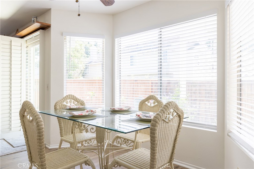 94 Wildwood, Unit 11 Irvine, CA 92604 - Photo 12 of 41 a dining room with furniture and window