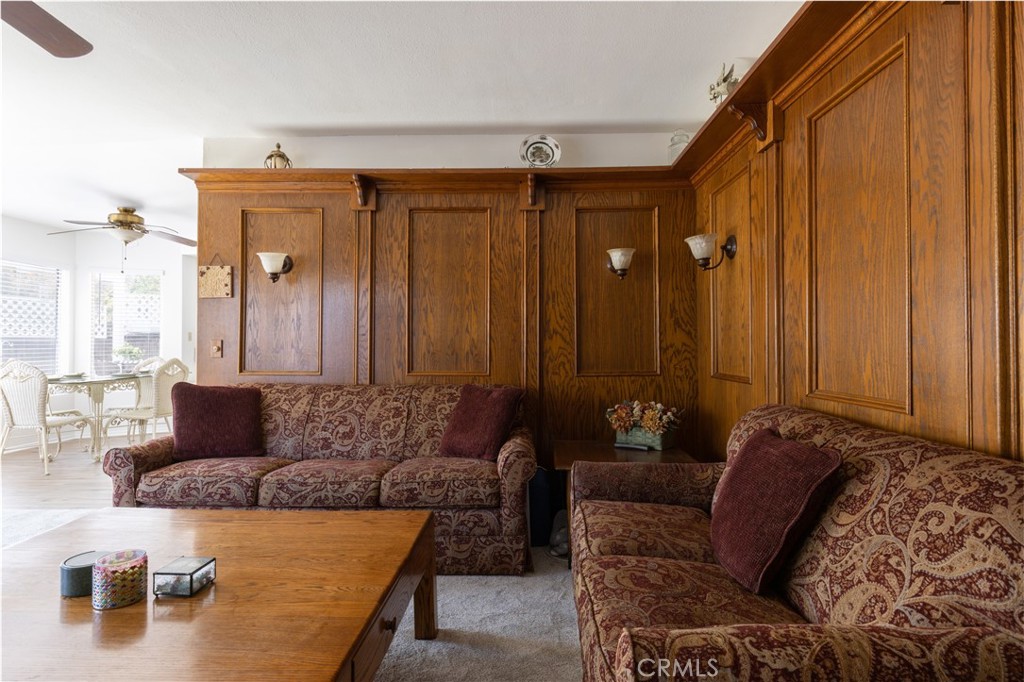 94 Wildwood, Unit 11 Irvine, CA 92604 - Photo 15 of 41 a living room with furniture and a painting