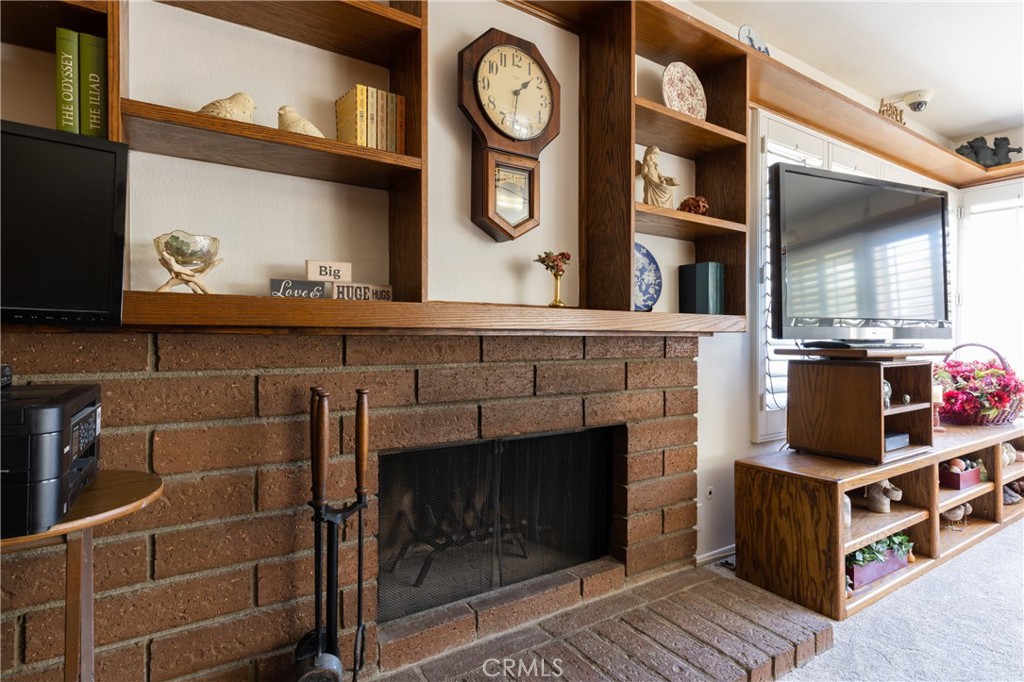 94 Wildwood, Unit 11 Irvine, CA 92604 - Photo 16 of 41 a stove top oven sitting inside of a kitchen