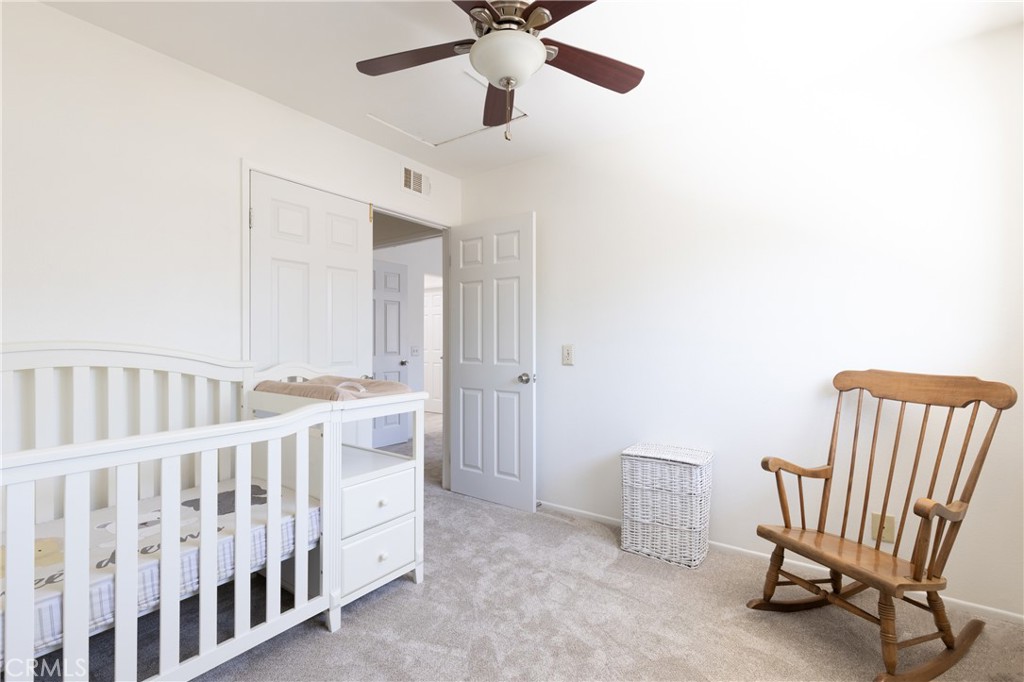 94 Wildwood, Unit 11 Irvine, CA 92604 - Photo 24 of 41 a view of a hallway with windows