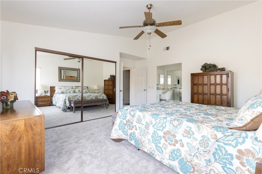 94 Wildwood, Unit 11 Irvine, CA 92604 - Photo 27 of 41 a bedroom with bed and window