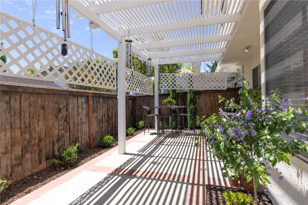 94 Wildwood, Unit 11 Irvine, CA 92604 - Photo 33 of 41 a view of a house with a porch