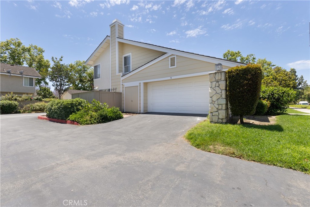 94 Wildwood, Unit 11 Irvine, CA 92604 - Photo 37 of 41 a view of a back yard of the house