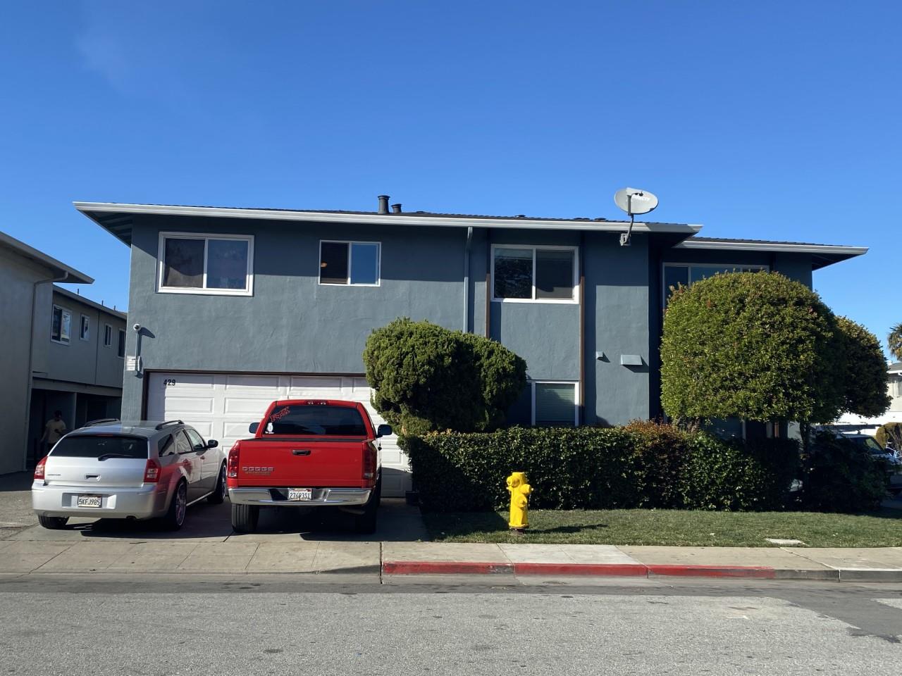 429 Studio Circle San Mateo, CA 94401 - Photo 2 of 12 a car parked in front of a house