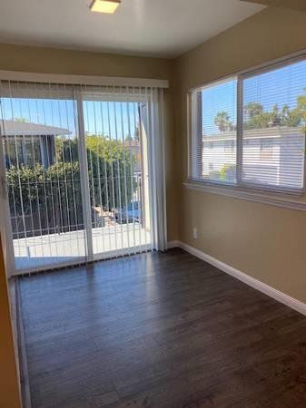 429 Studio Circle San Mateo, CA 94401 - Photo 9 of 12 a view of entryway with wooden floor
