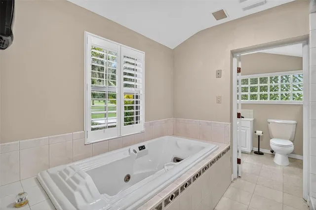 a bathroom with a sink and a window