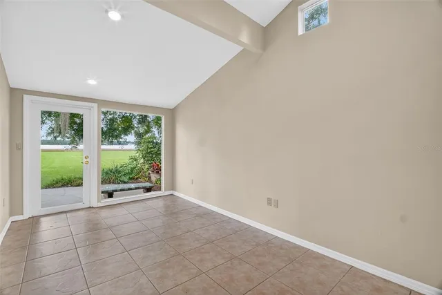 a view of a hallway with washer and dryer