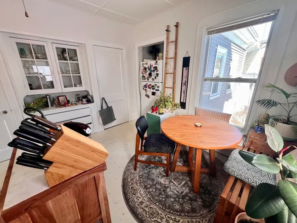 a table and chairs in a room