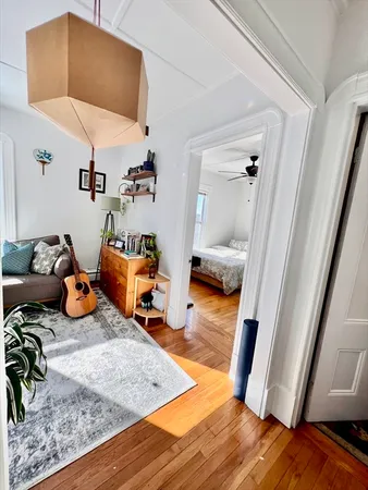 a room with furniture and a wooden floor