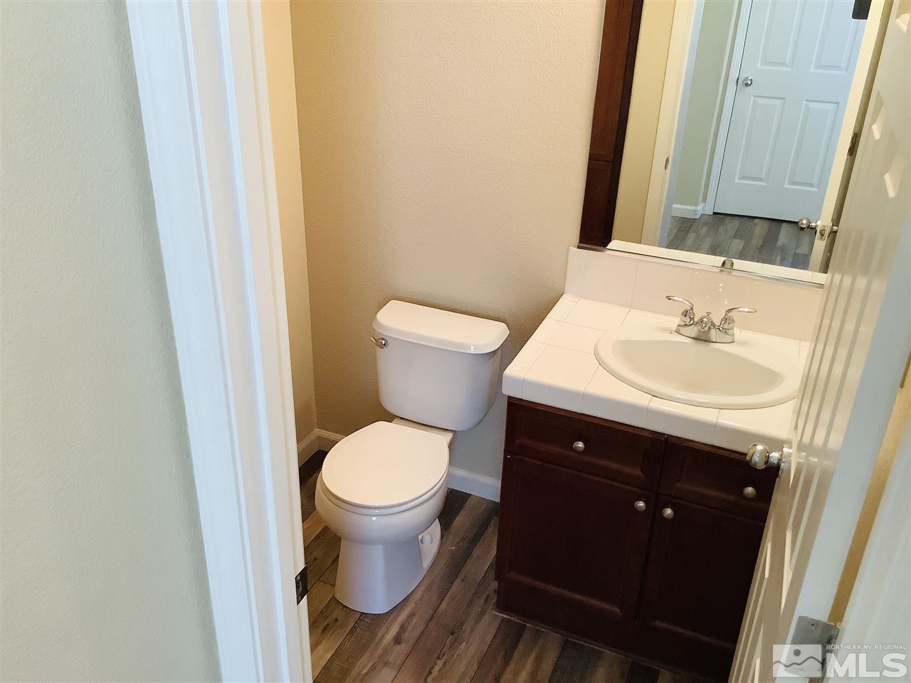 9375 Hummer Court Reno, NV 89521 - Photo 12 of 23 a bathroom with a sink and a toilet