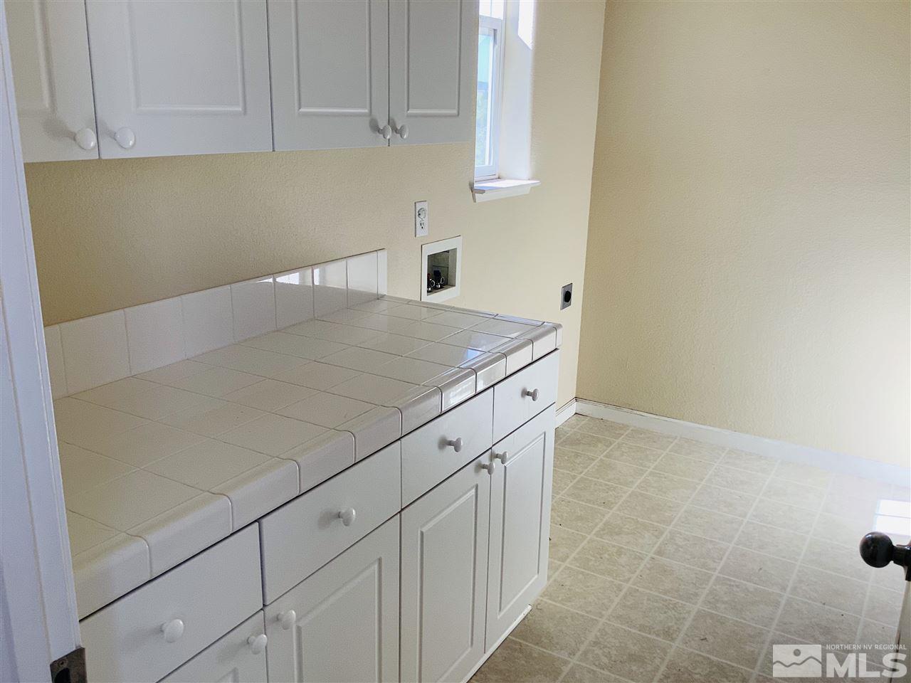 9375 Hummer Court Reno, NV 89521 - Photo 14 of 23 a room with cabinets