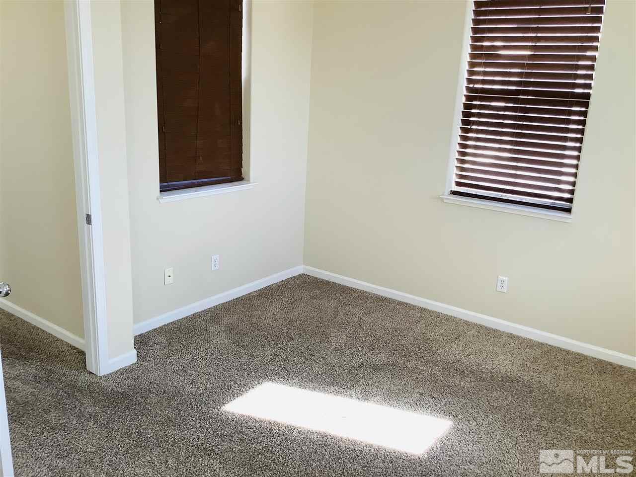 9375 Hummer Court Reno, NV 89521 - Photo 15 of 23 an empty room with windows