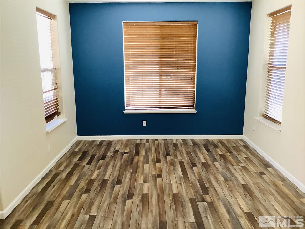 9375 Hummer Court Reno, NV 89521 - Photo 10 of 23 a view of an empty room with a window