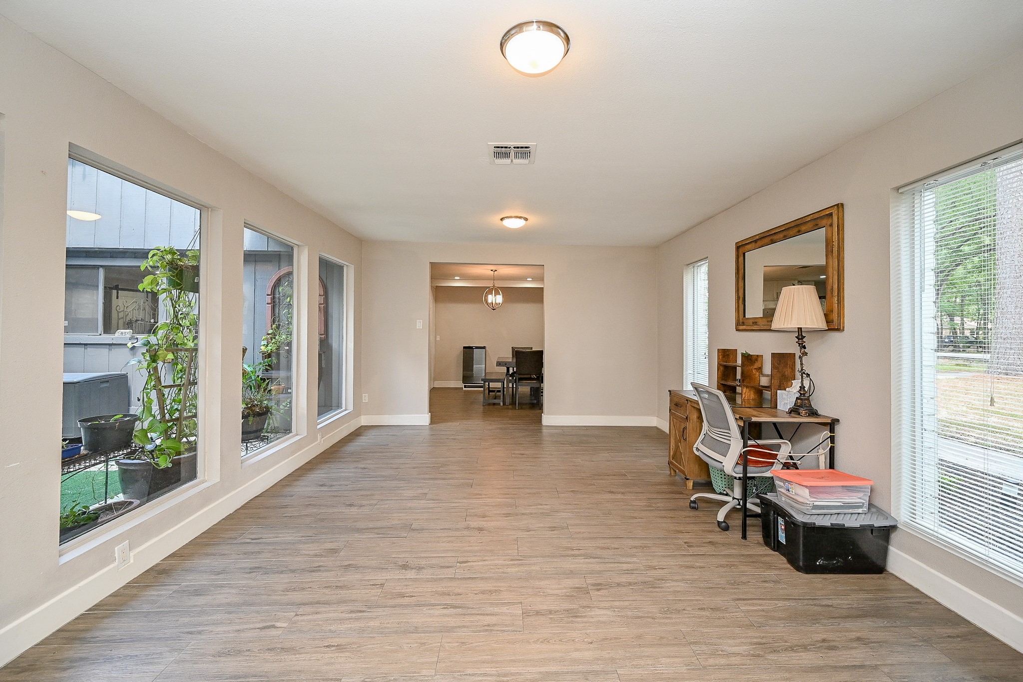 2406 Encreek Road Houston, TX 77068 - Photo 14 of 25 a room with furniture and a large window