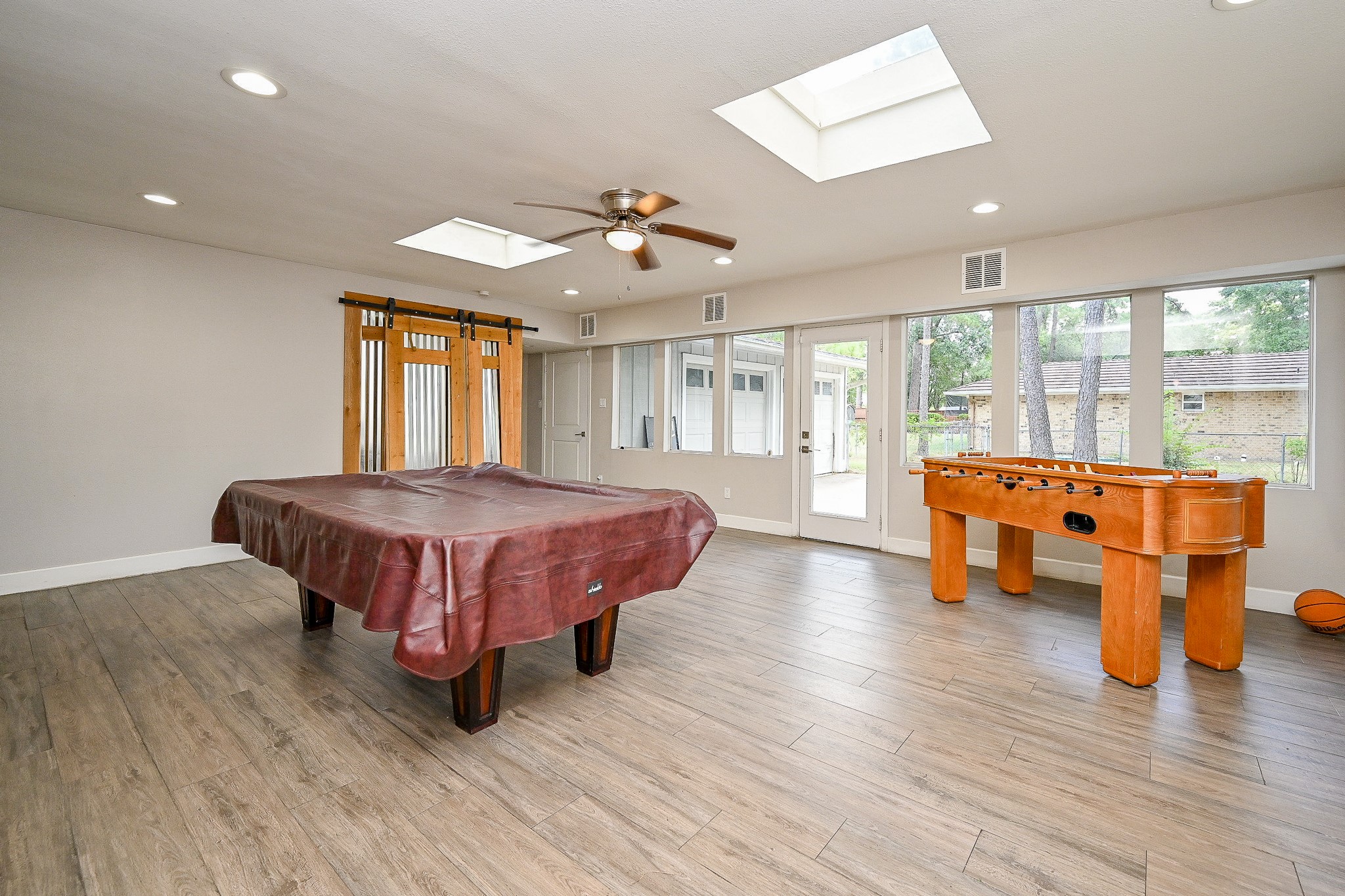 2406 Encreek Road Houston, TX 77068 - Photo 2 of 25 a living room with furniture and wooden floor