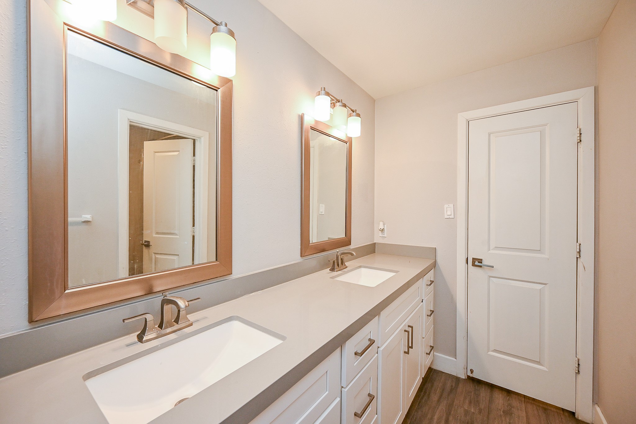 2406 Encreek Road Houston, TX 77068 - Photo 21 of 25 a bathroom with a sink a vanity and a mirror