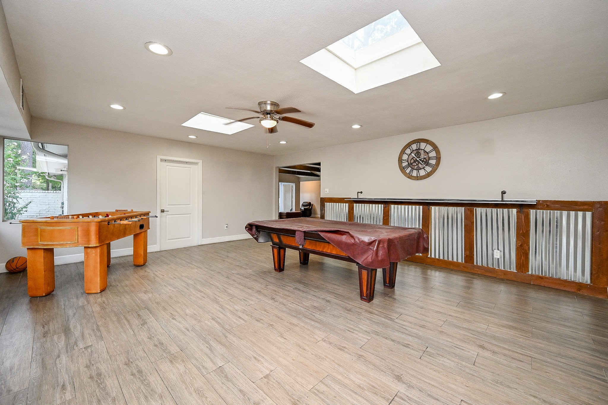 2406 Encreek Road Houston, TX 77068 - Photo 3 of 25 a living room with furniture and a wooden floor