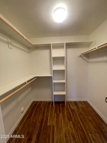 a view of a room with wooden floor and floors
