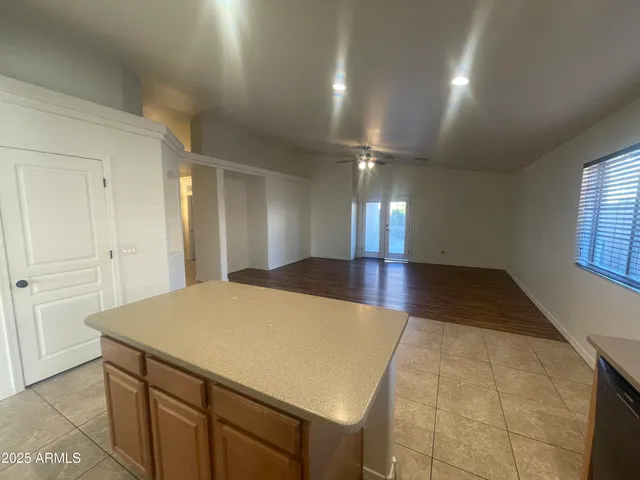 an empty room with wooden floor