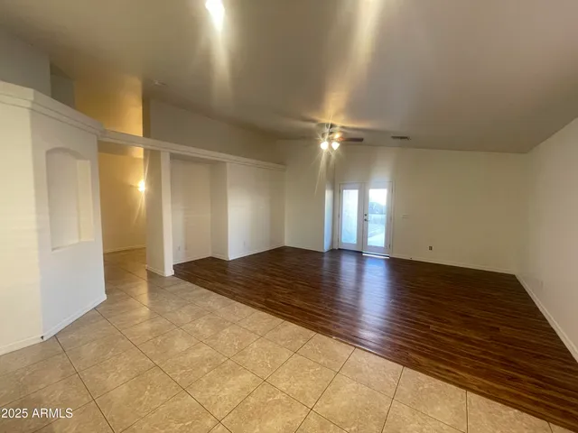 a view of an empty room and window