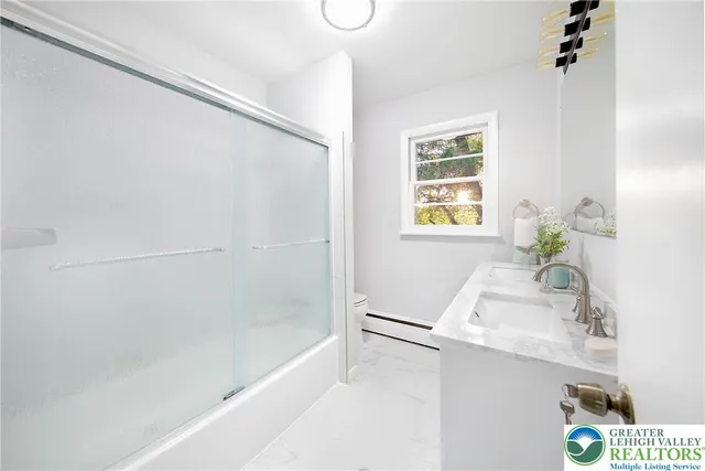 a bathroom with a sink and a bathtub