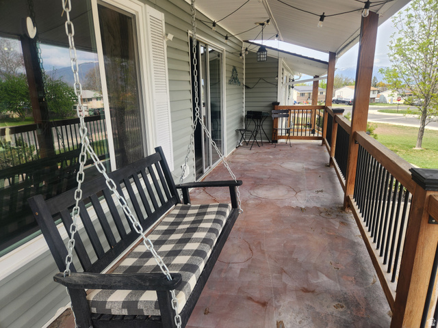 705 North 700 East Payson, UT 84651 - Photo 11 of 30 Covered porch featuring a residential view