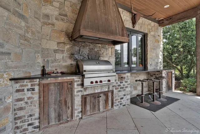 a kitchen with a stove and a refrigerator