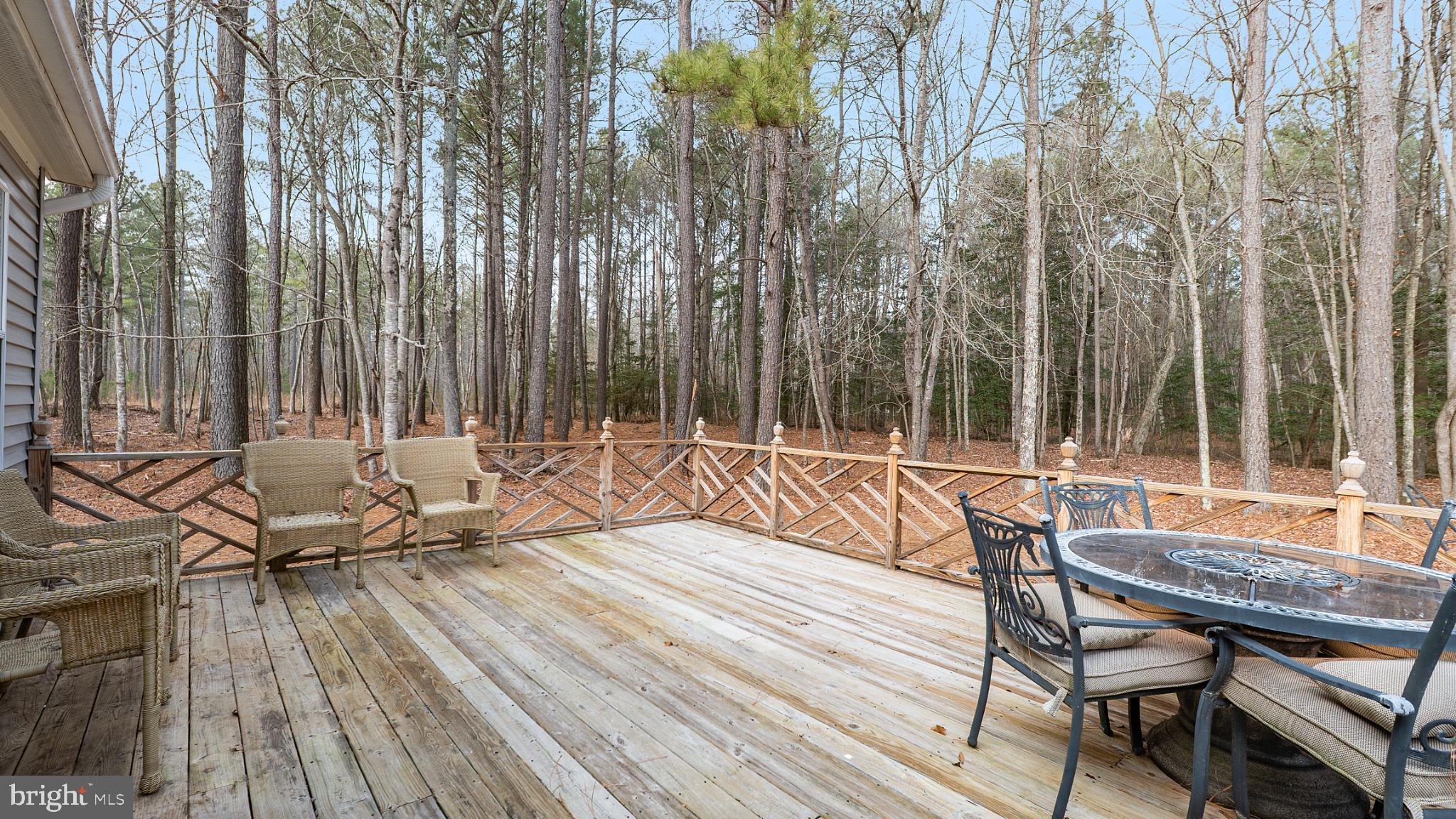 32520 Seatick Road Eden, MD 21822 - Photo 18 of 31 a view of a patio with a table and chairs