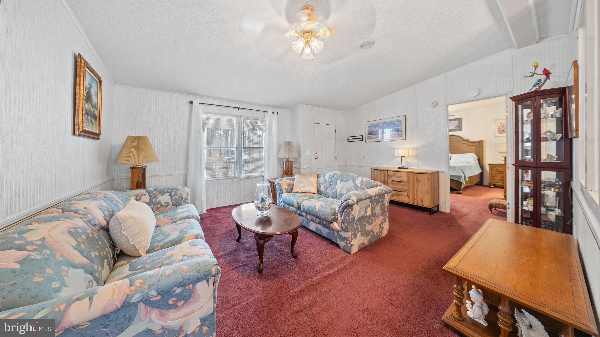 32520 Seatick Road Eden, MD 21822 - Photo 5 of 31 a living room with furniture and wooden floor