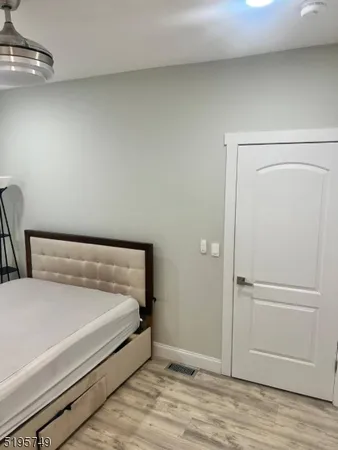 a bed room with a bed and a table