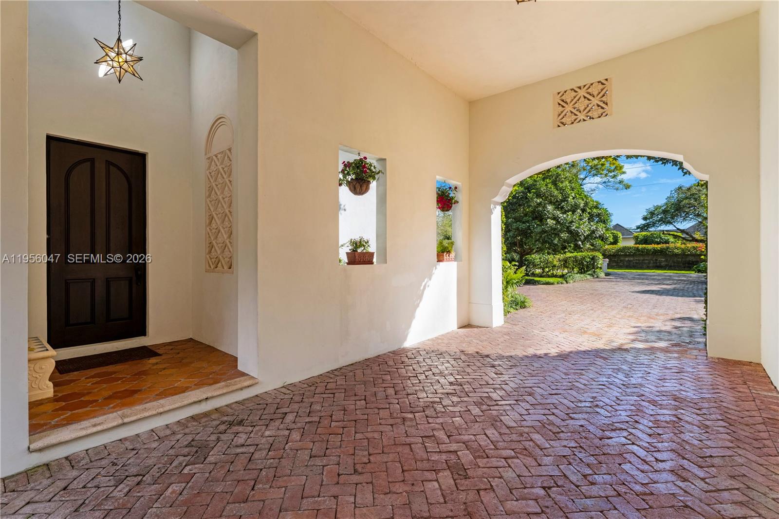 6991 Southwest 144th Street Palmetto Bay, FL 33158 - Photo 44 of 65 Carport and walkway to Guest House