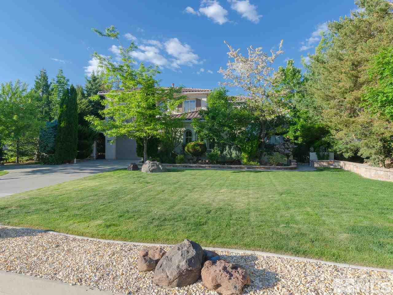 2938 Flint Ridge Court Reno, NV 89511 - Photo 1 of 25 a front view of a house with a yard