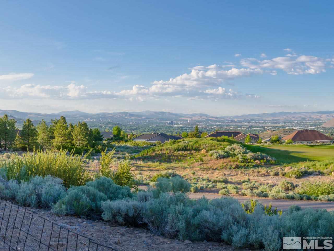 2938 Flint Ridge Court Reno, NV 89511 - Photo 25 of 25 a view of a lake with a city