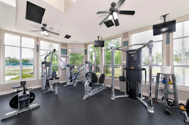 a view of a livingroom with gym equipment