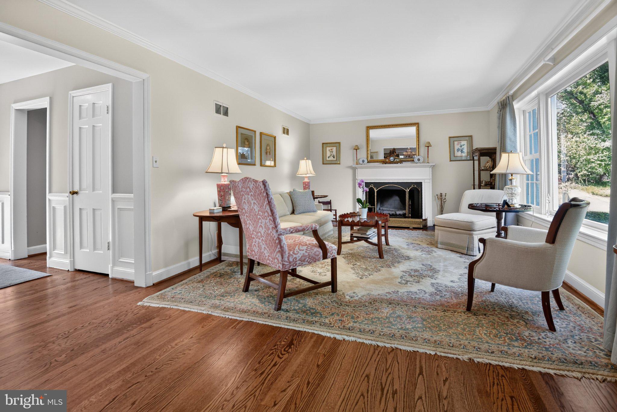 5305 Ridgefield Road Bethesda, MD 20816 - Photo 4 of 43 Elegant Living Room with wood burning fireplace