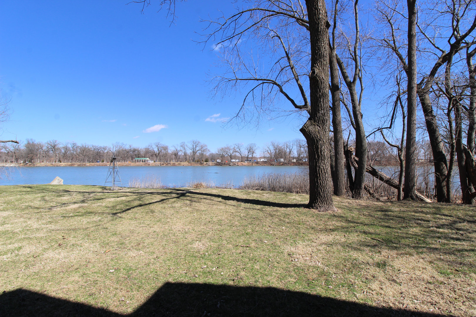 3435 South Riverview Court Kankakee, IL 60901 - Photo 13 of 16 a view of a lake with houses in the background