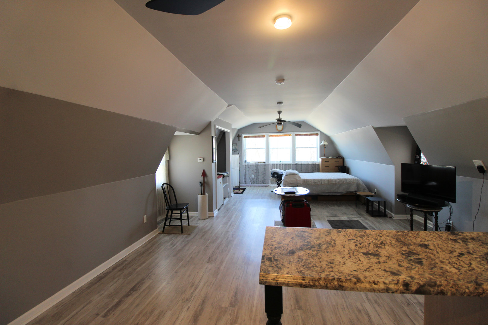 3435 South Riverview Court Kankakee, IL 60901 - Photo 3 of 16 a living room with fireplace furniture and a wooden floor