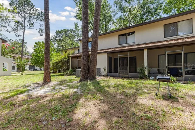 a house with trees in front of it