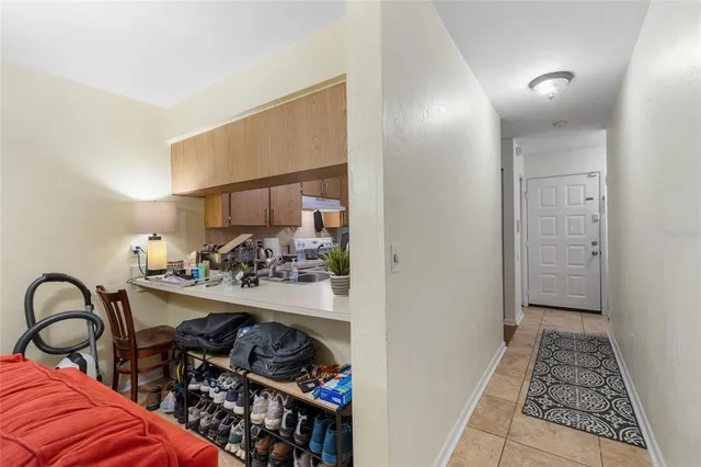 a view of a livingroom with furniture and entryway