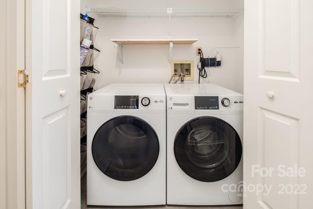 5003 Sharon Road, Unit C Charlotte, NC 28210 - Photo 23 of 27 a utility room with dryer and washer