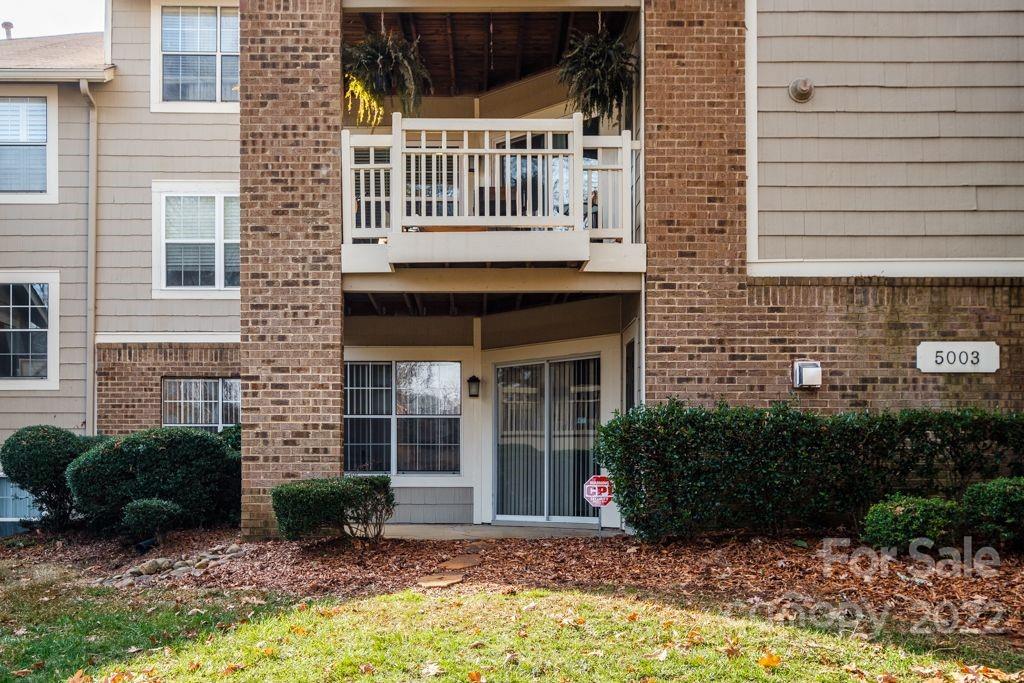 5003 Sharon Road, Unit C Charlotte, NC 28210 - Photo 27 of 27 a view of a house with backyard and sitting area