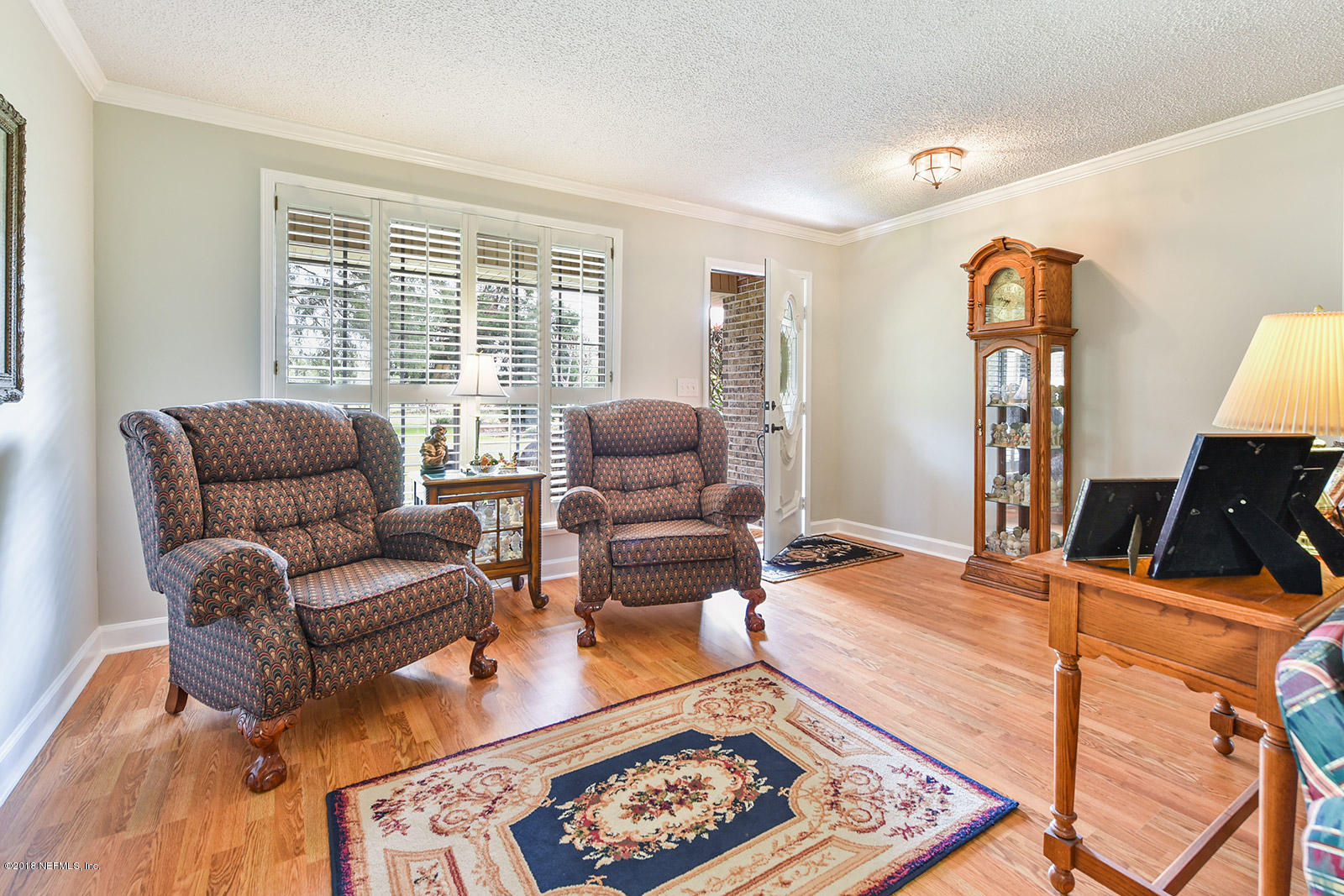 54219 Marlee Road Callahan, FL 32011 - Photo 5 of 26 a living room with furniture and wooden floor