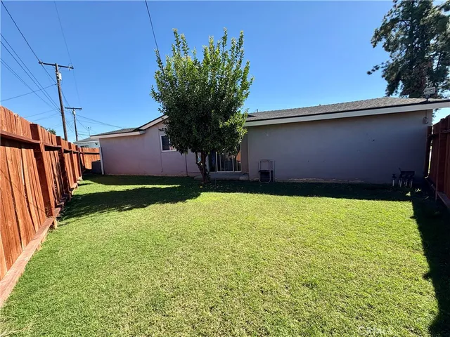 a house with garden in front of it