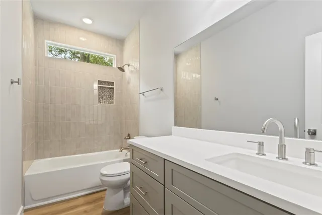 a kitchen with a sink cabinets and window
