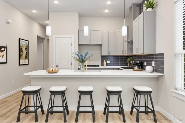 a bedroom with a bed and a night stand