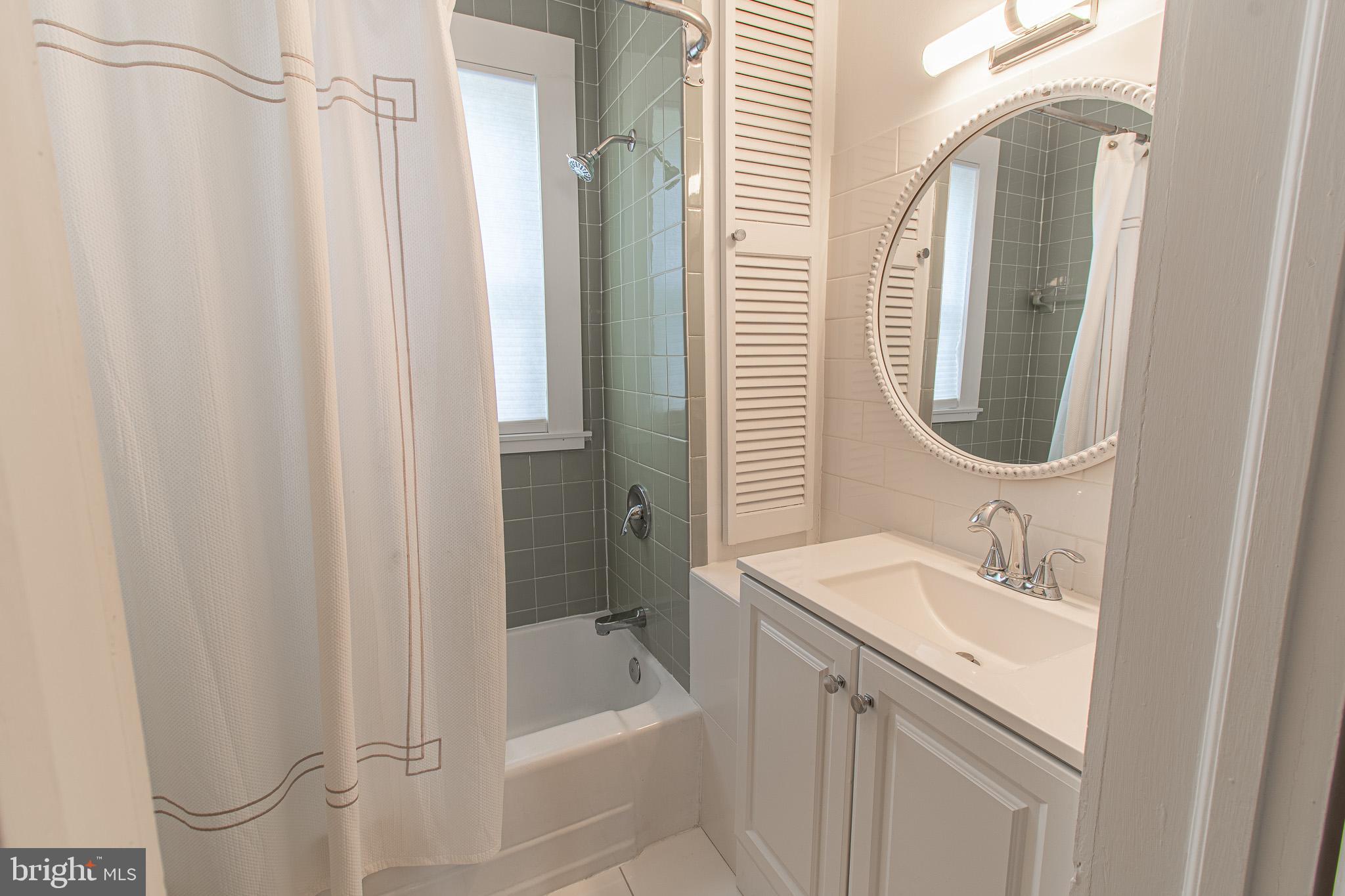 207 Crusader Road Cambridge, MD 21613 - Photo 41 of 76 a bathroom with a sink a toilet and shower