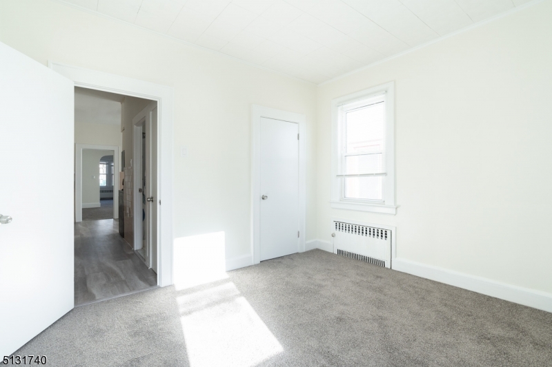 208 Tuscan Road, Unit 1 Maplewood, NJ 07040 - Photo 12 of 15 a view of an empty room