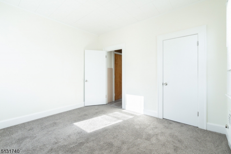 208 Tuscan Road, Unit 1 Maplewood, NJ 07040 - Photo 13 of 15 a view of an empty room
