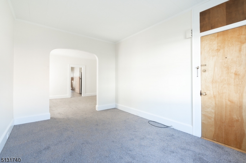 208 Tuscan Road, Unit 1 Maplewood, NJ 07040 - Photo 4 of 15 a view of a room that has a grey walls
